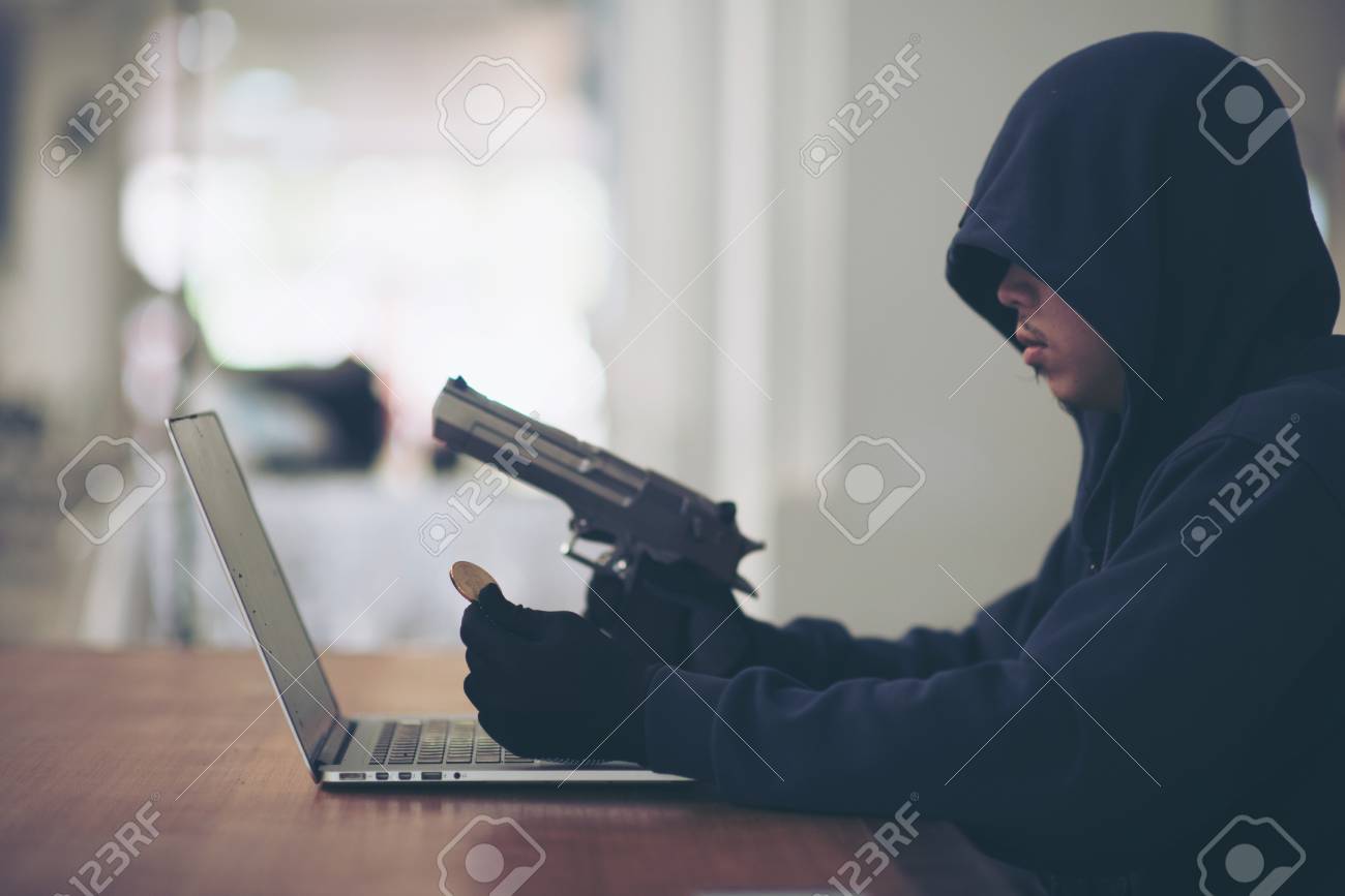 Closeup Photo Of Male Hacker Counting Bitcoin When He Using Computer - 